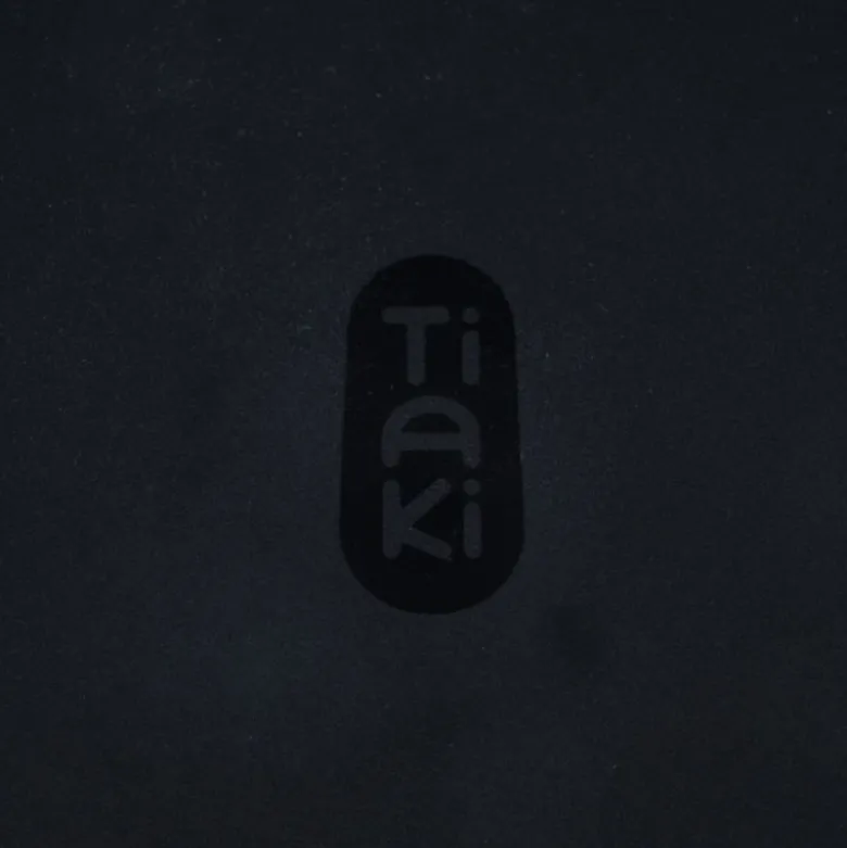TIAKI dækkeserviet Kødben, sort